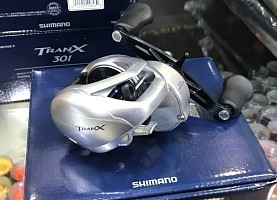 Катушки мультипликаторные Shimano Tranx 301A.